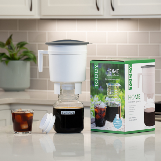 Toddy cold brew system in home kitchen with coffee over ice