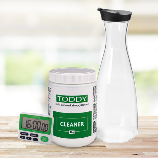 Toddy Timer, Cleaner and Carafe on a counter top