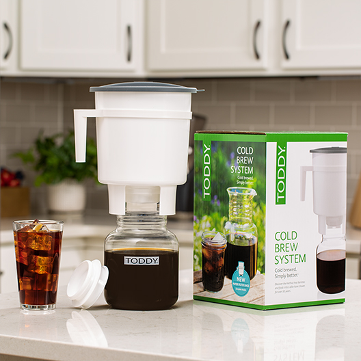 Toddy cold brew system in home kitchen with coffee over ice
