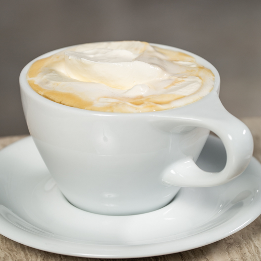 Winter Cappuccino in a white mug and saucer