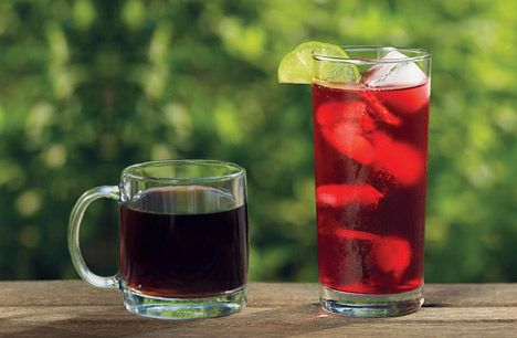 side by side photo of a glass of cold brew coffee and hibiscus tea over ice with a lime wedge on the rim sitting on a table outside