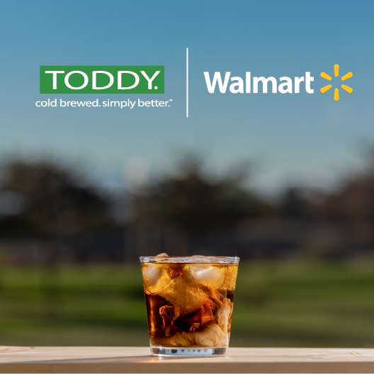 Toddy and Walmart logos abobve a cold brew coffee with cream over ice